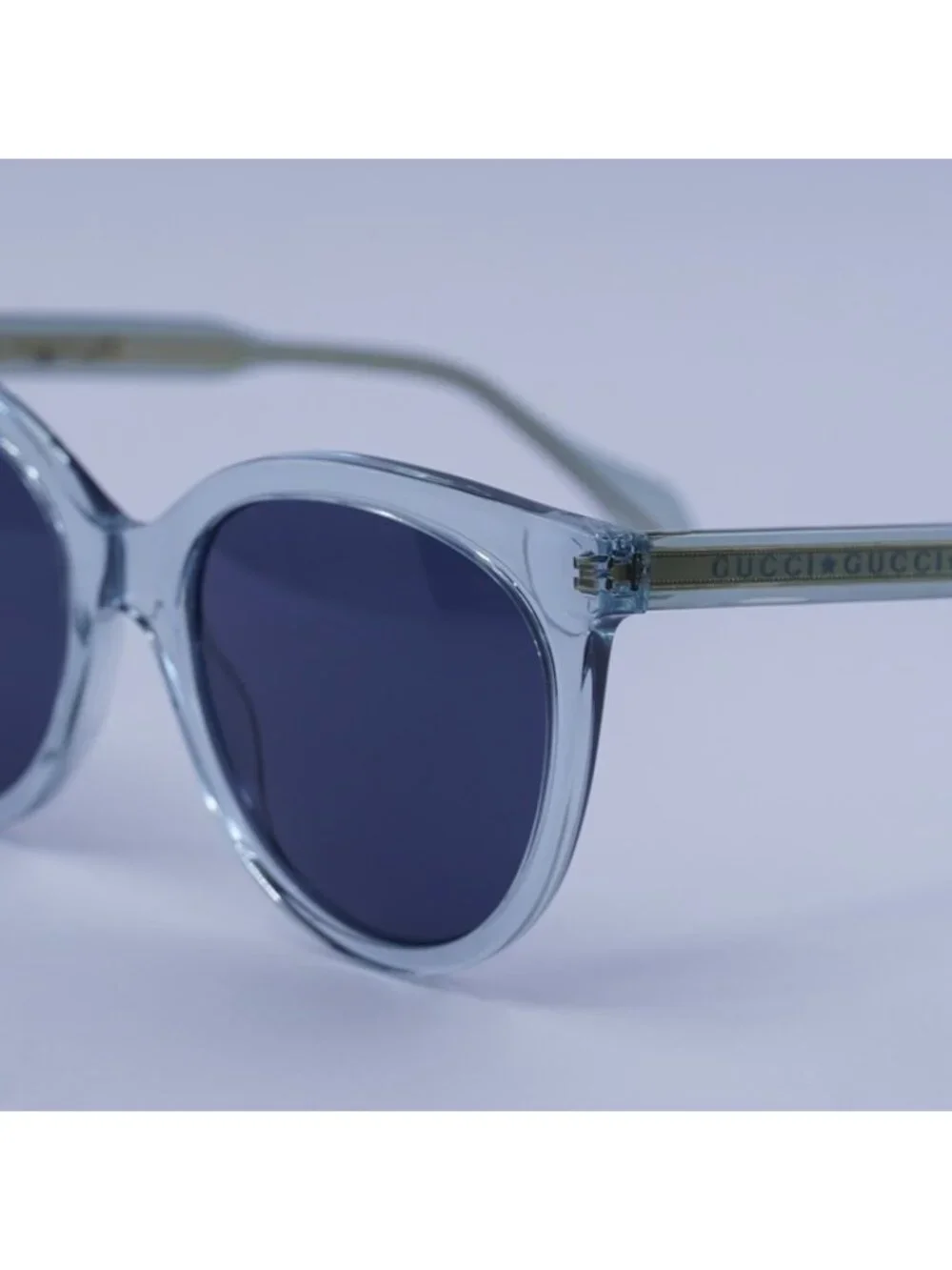 Gucci GG0565S 003 Sunglasses Blue Cat Eye Frame, Blue Lenses
